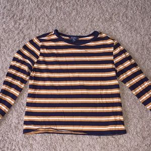 White , orange, blue crop top